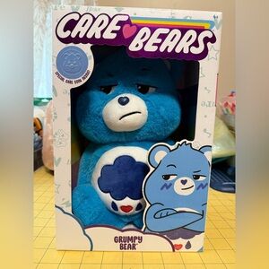 Care Bear Grumpy Bear plush with coin, Brand New!